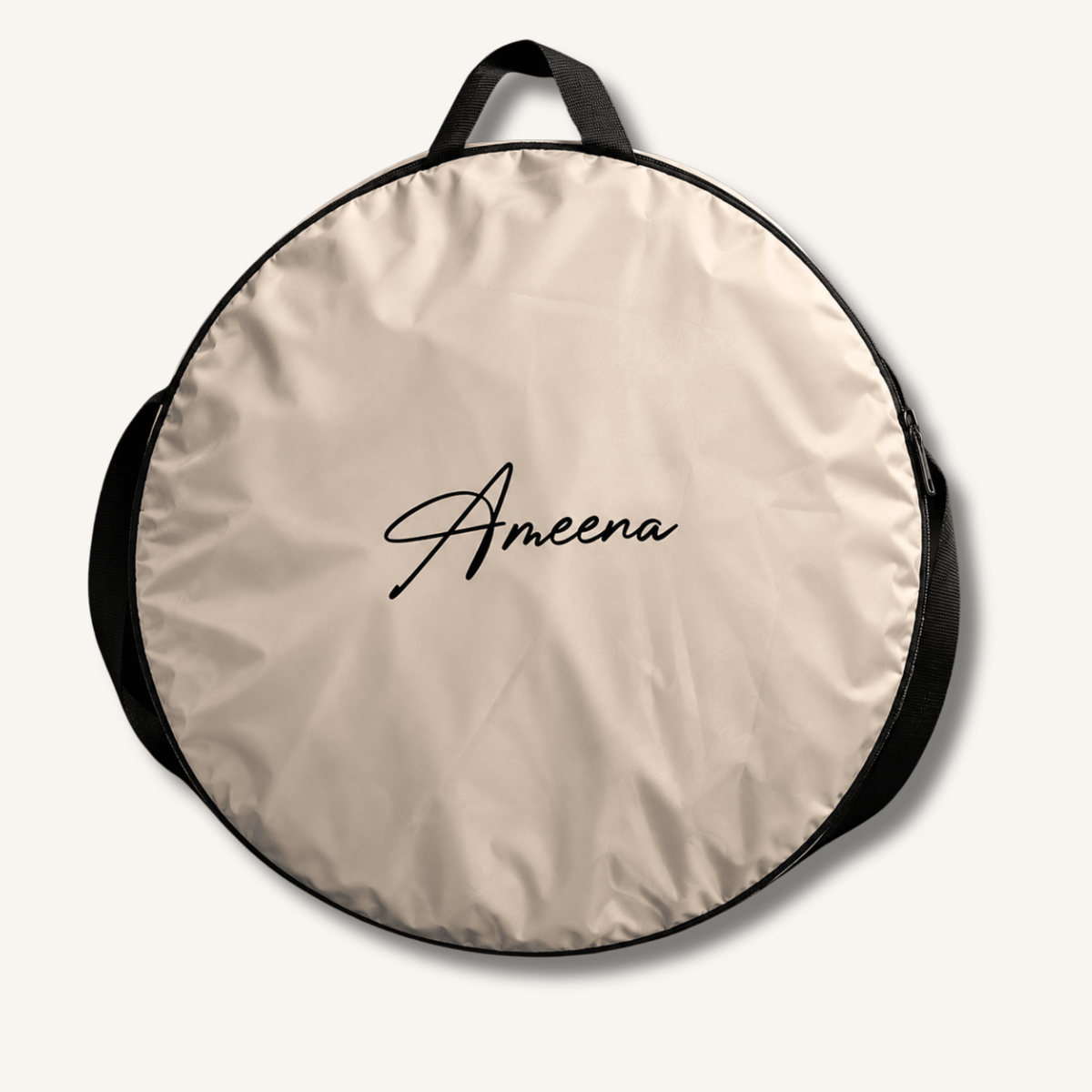 Tente de prière AMEENA beige pliée dans son sac de transport compact — prière nomade partout